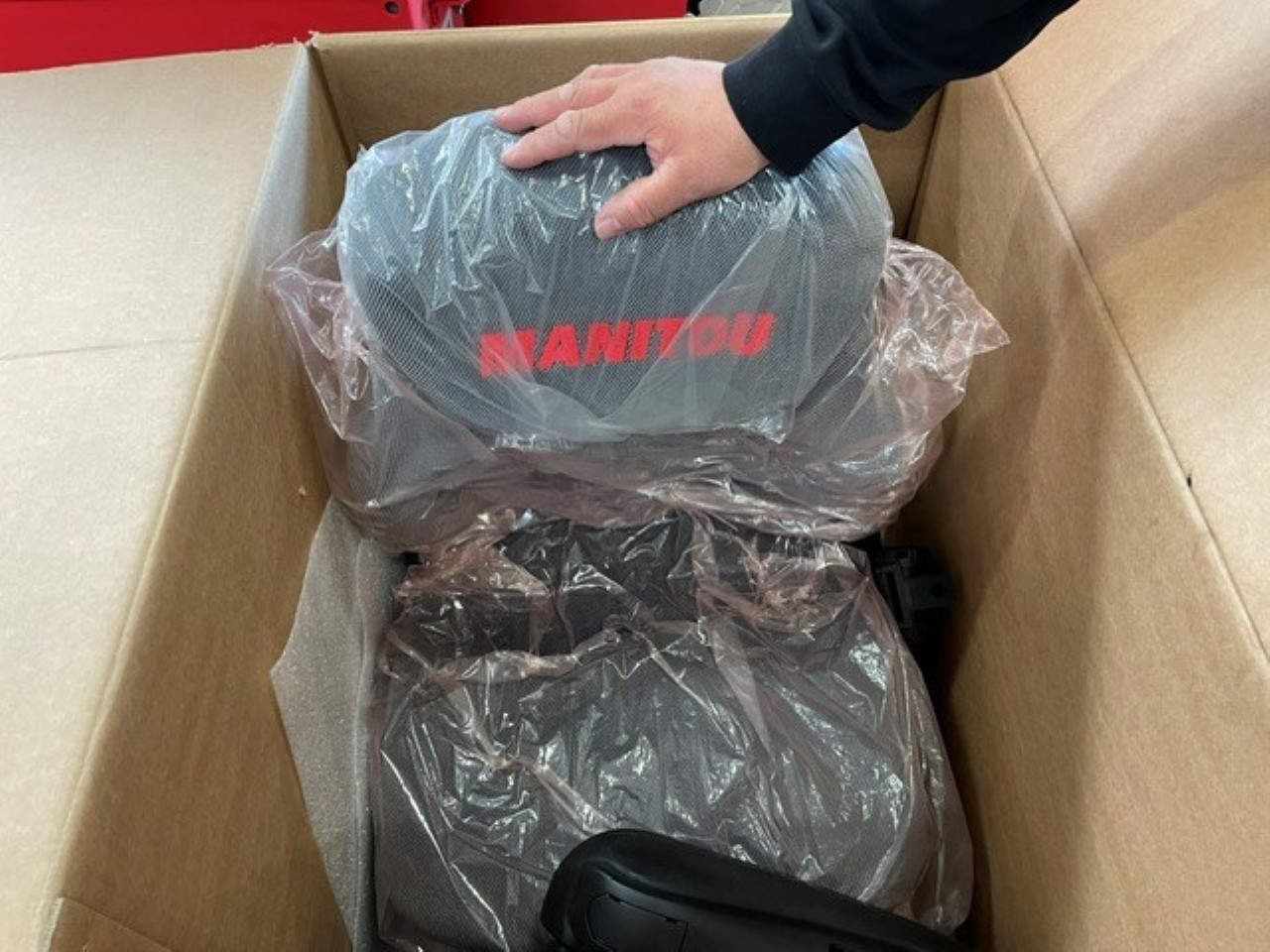 Manitou Sæde